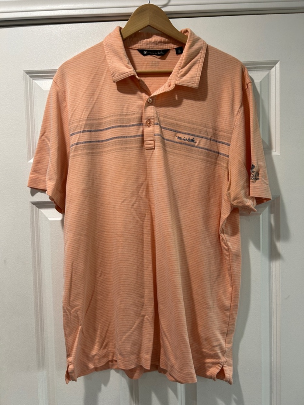 Travis Mathew Peach Short-Sleeve Polo with Subtle Stripe
